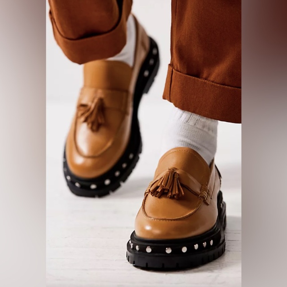 Free People Brown Tassel Loafers with Black Soles.